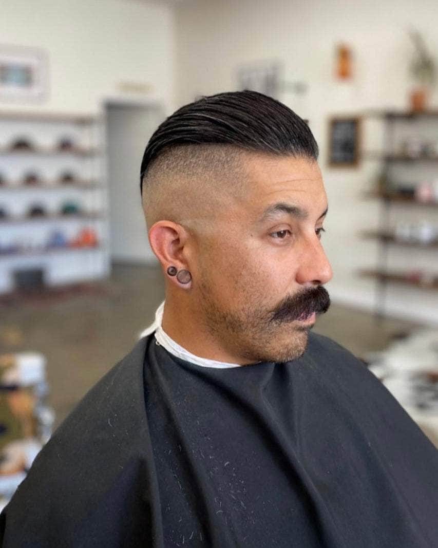 Wolf’s Head Styling Gel Pomade used on slick haircut at Wolf’s Head Barbershop in Santa Barbara – strong hold high shine water based hair product