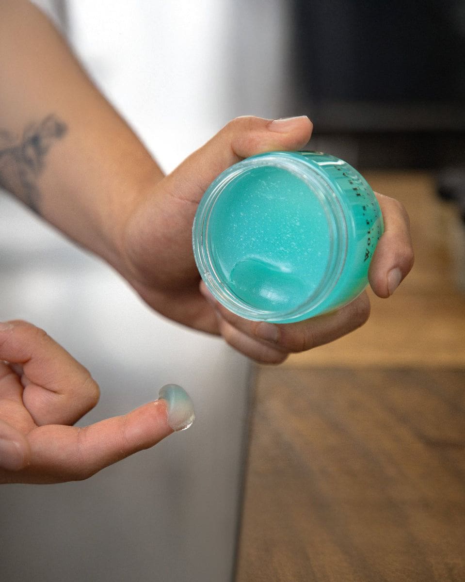 Wolf’s Head How to use Water Soluble Pomade - Scoop on fingertip detail – strong hold, shine finish grooming product made in California