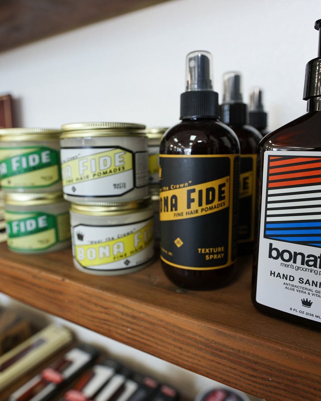 Bottle of bonafide hand sanitizer on a shelf with other products