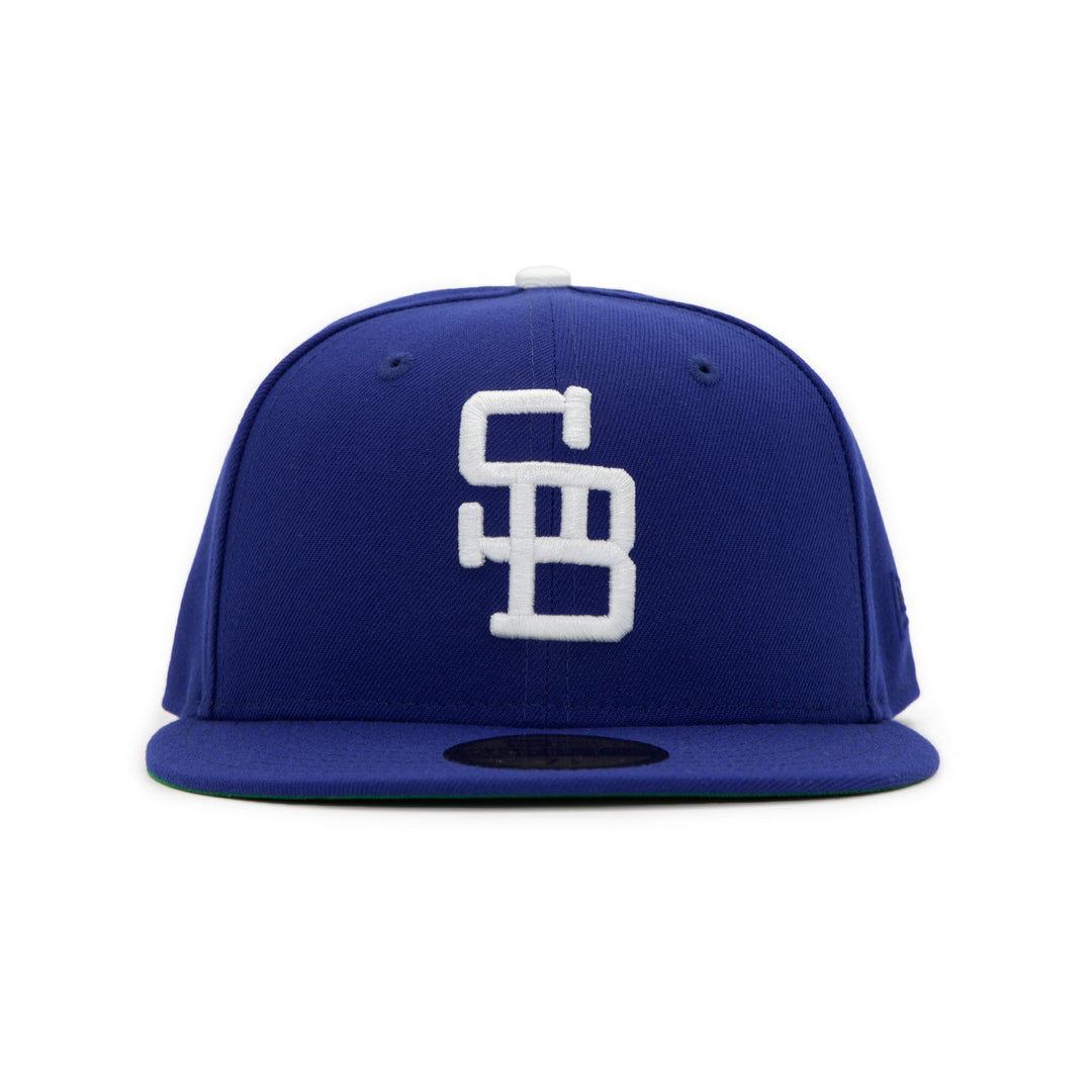 Santa Barbara Dodgers x New Era Dodger Blue 59FIFTY Fitted Hat – Quality Headwear & Classic Streetwear Baseball Cap. Available at Wolf's Head.