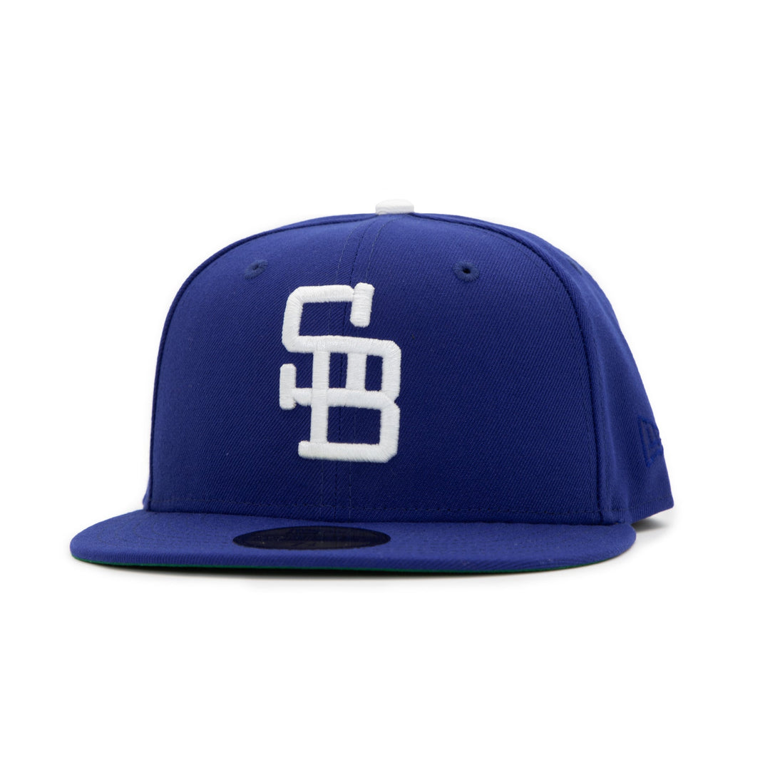 Santa Barbara Dodgers x New Era Dodger Blue 59FIFTY Fitted Hat – Quality Headwear & Classic Streetwear Baseball Cap. Available at Wolf's Head. Front Left