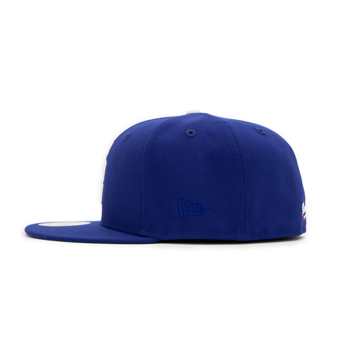 Santa Barbara Dodgers x New Era Dodger Blue 59FIFTY Fitted Hat – Quality Headwear & Classic Streetwear Baseball Cap. Available at Wolf's Head. Left