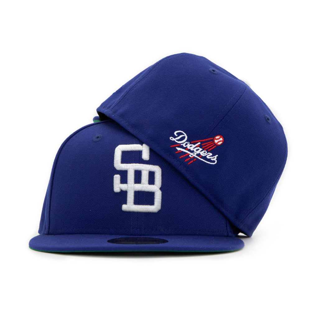 Santa Barbara Dodgers x New Era Dodger Blue 59FIFTY Fitted Hat – Quality Headwear & Classic Streetwear Baseball Cap. Available at Wolf's Head. Stacked