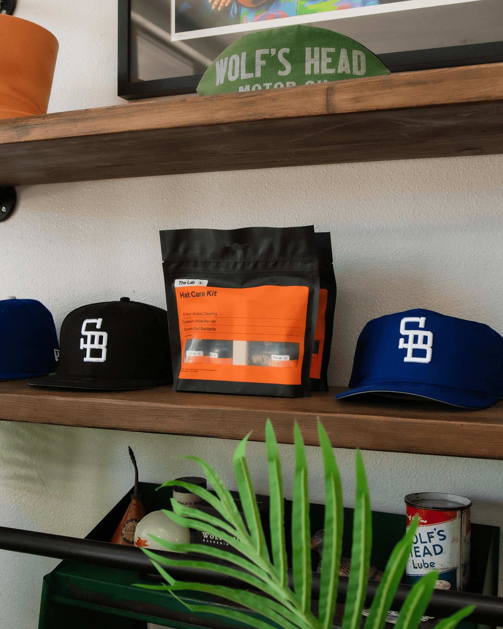 The Lab Hat Cleaner probiotic solution. Breaks down dirt and cleans for up to 3 days. Biodegradable and vegan certified. Available at Wolf's Head.