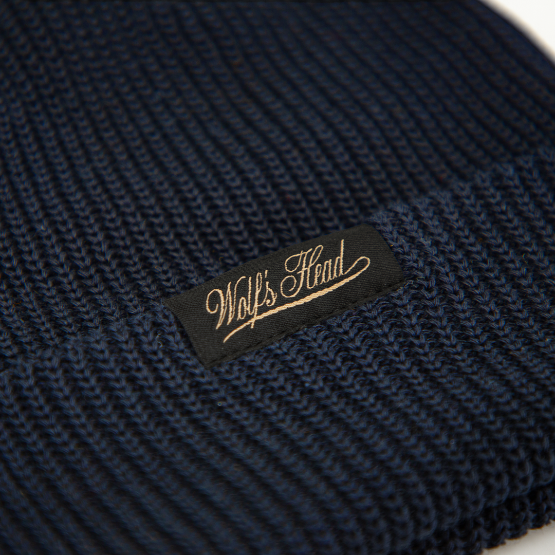 Wolf’s Head Script Label Shaker Knit Beanie – Navy Label Detail Close-Up