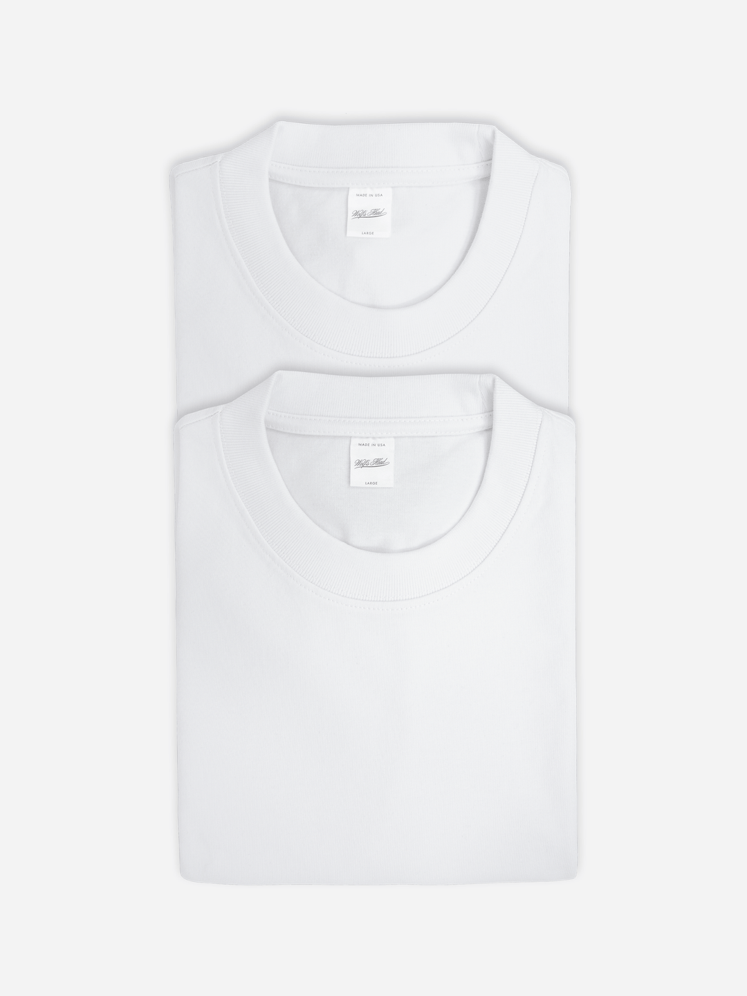 Folded white heavyweight tee two pack from Wolf&