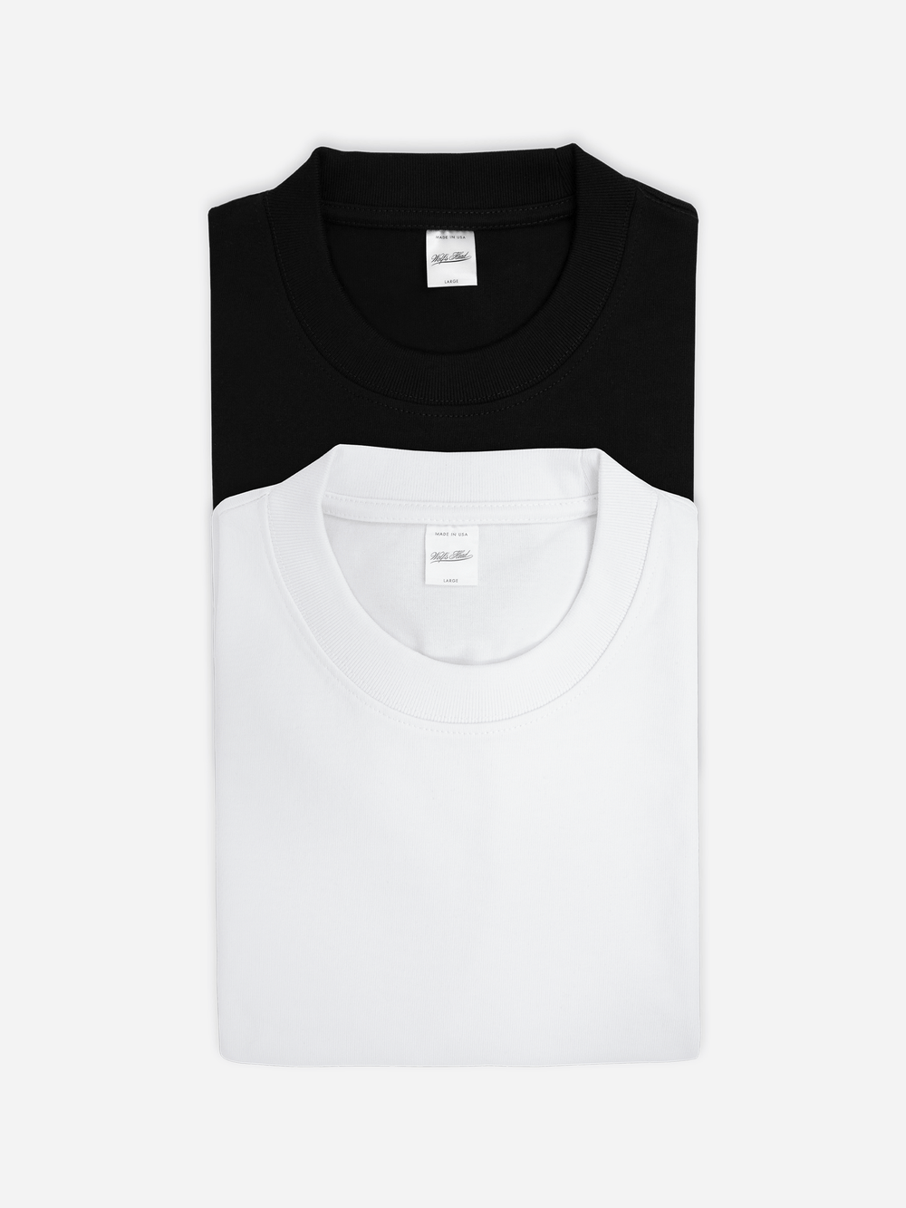 Folded black and white heavyweight tee two pack from Wolf's Head, 10.5oz 353 GSM combed cotton jersey