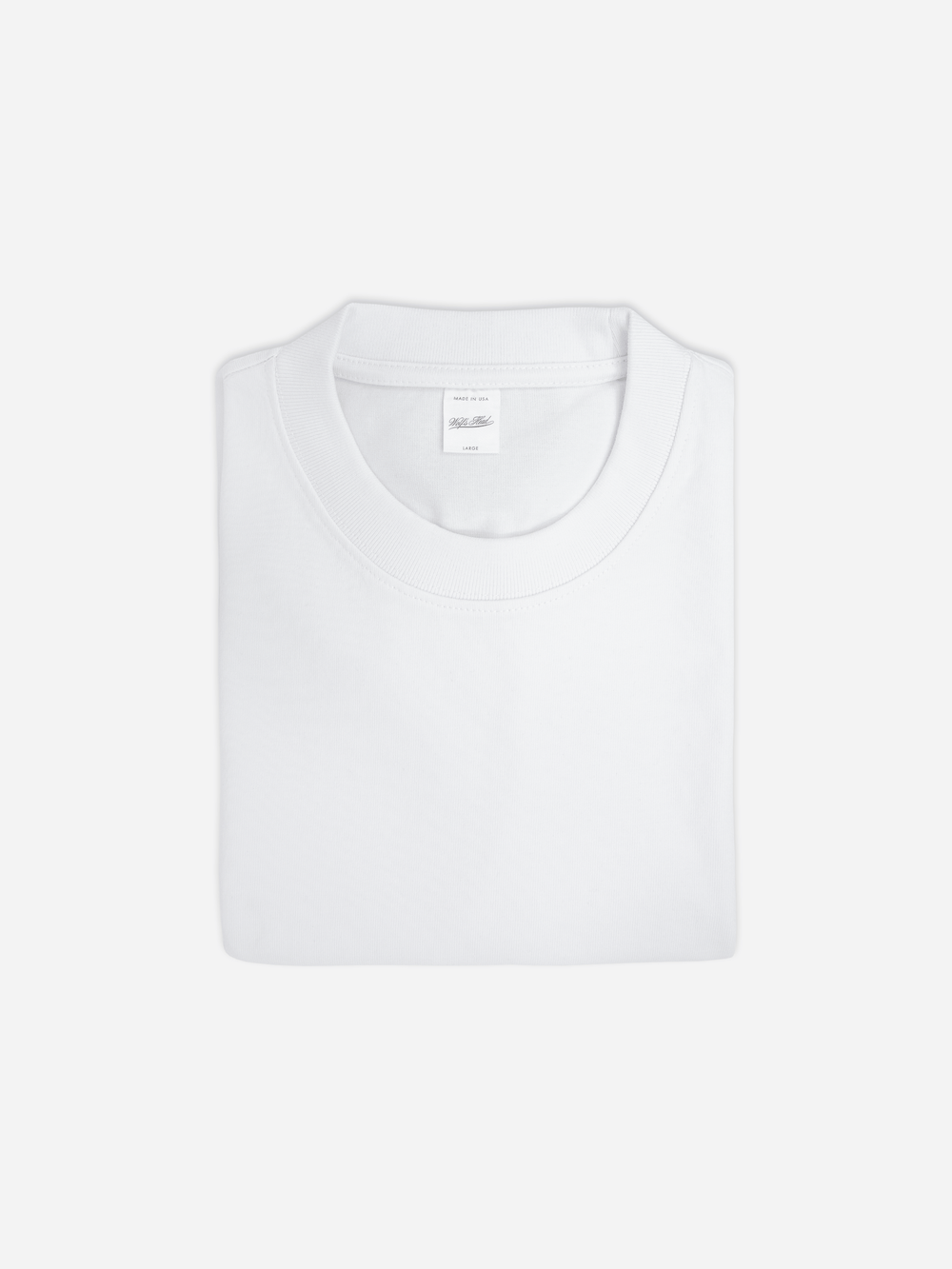 Folded Wolf's Head white heavyweight blank tee in 10.5oz 353 GSM combed cotton jersey